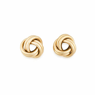 A pair of yellow gold love knot stud earrings with a three-strand interlaced design and a smooth, high-polish finish, photographed on a white background.