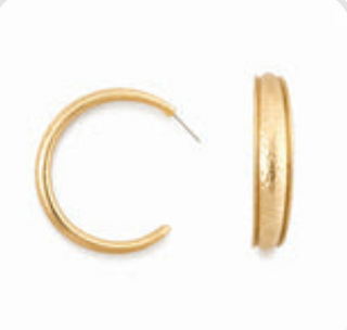 Two matte gold hoop earrings with a hammered tube finish, shown from the front and side, measuring 1.5 inches in diameter with a post closure.